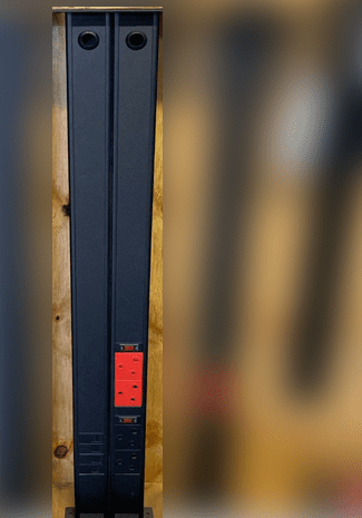 dual side by side power pole system supplying power and data to multiple office workstations